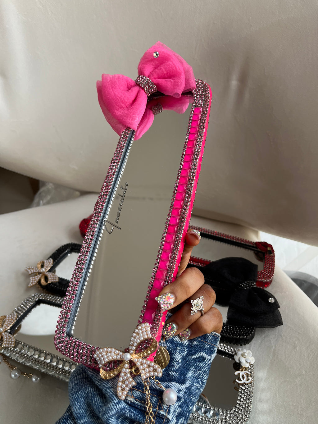 Diamond encrusted (hot pink) bow car rear view mirror cover