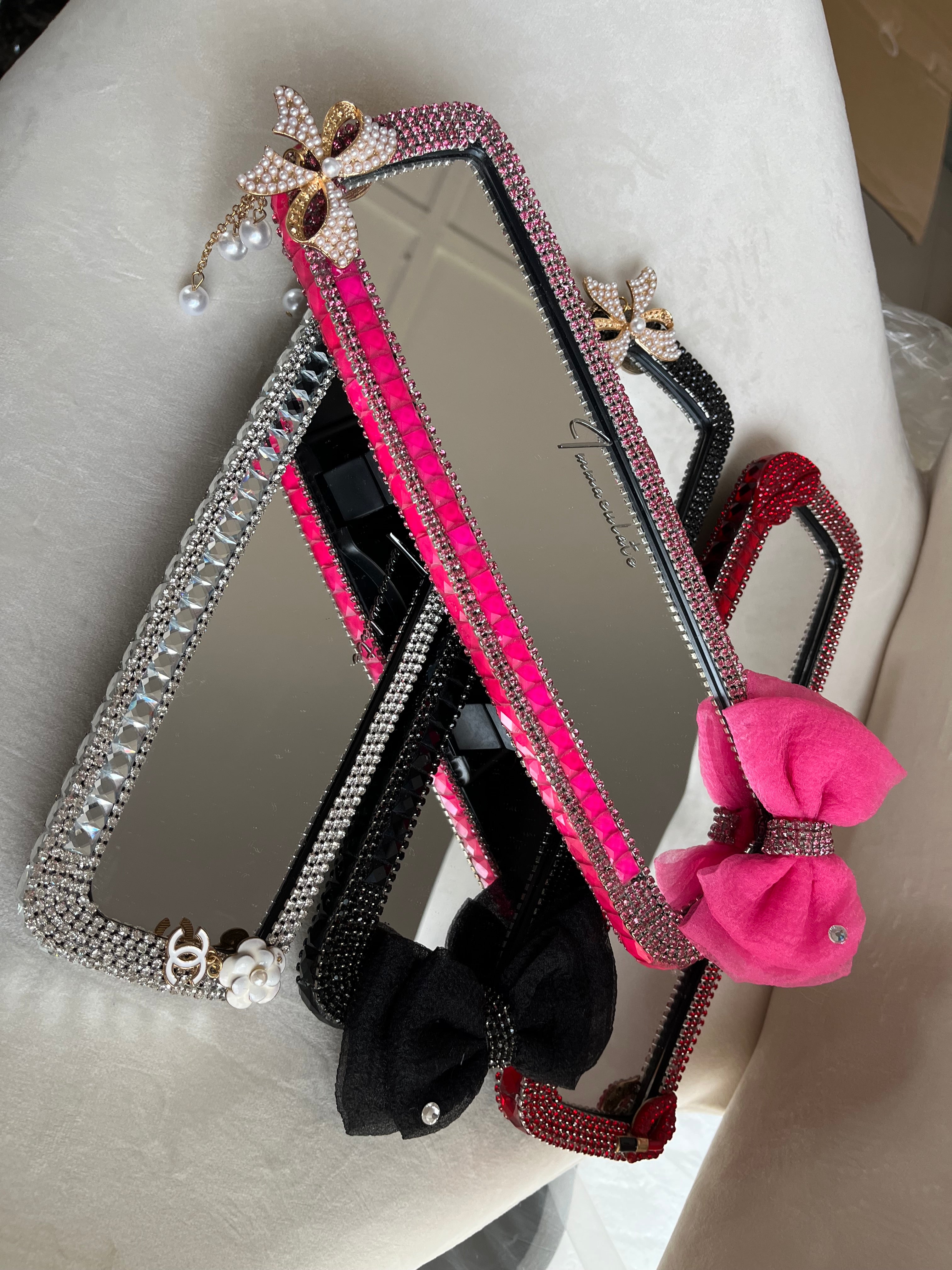 Diamond encrusted (hot pink) bow car rear view mirror cover