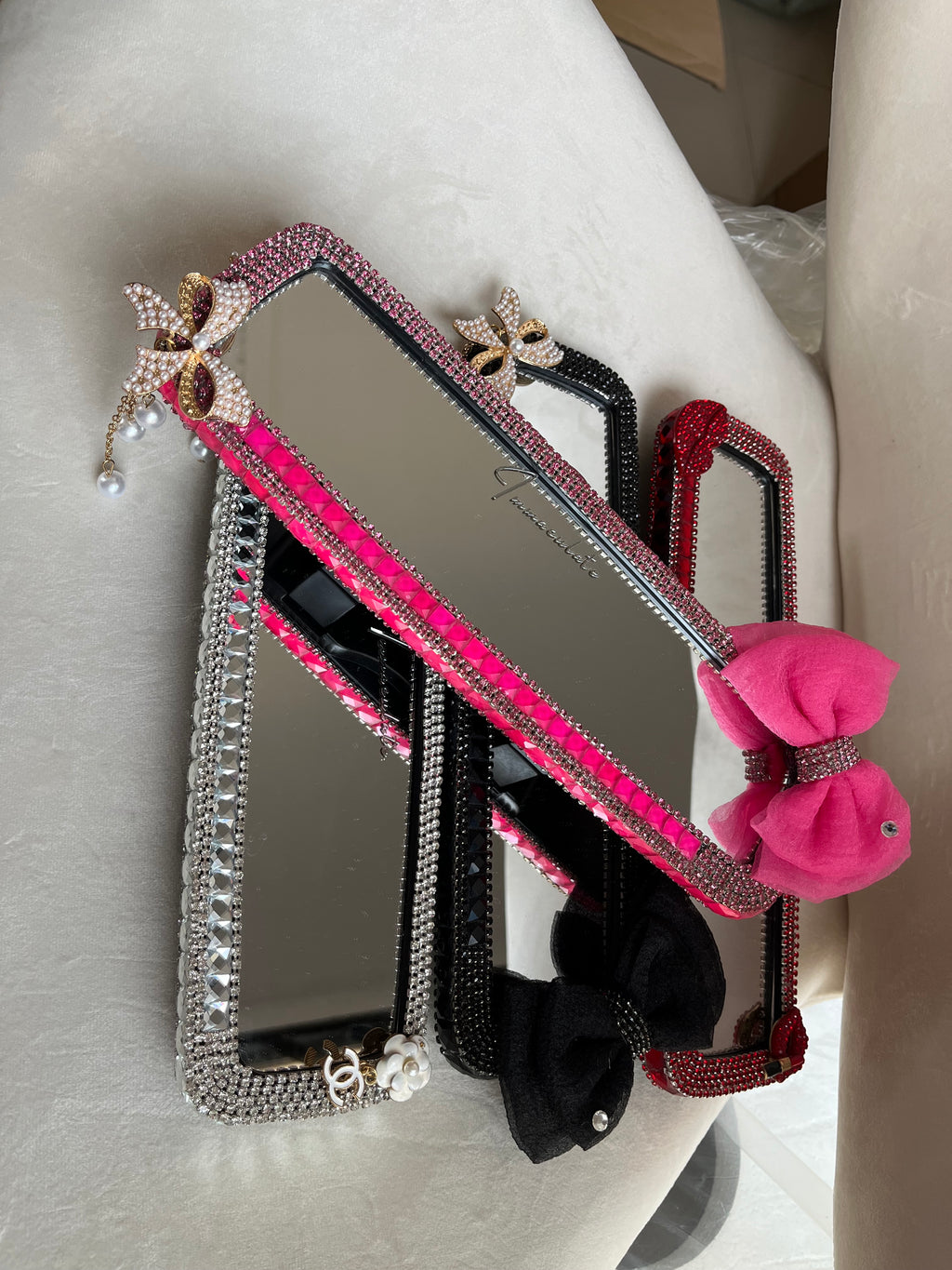 Diamond encrusted (hot pink) bow car rear view mirror cover