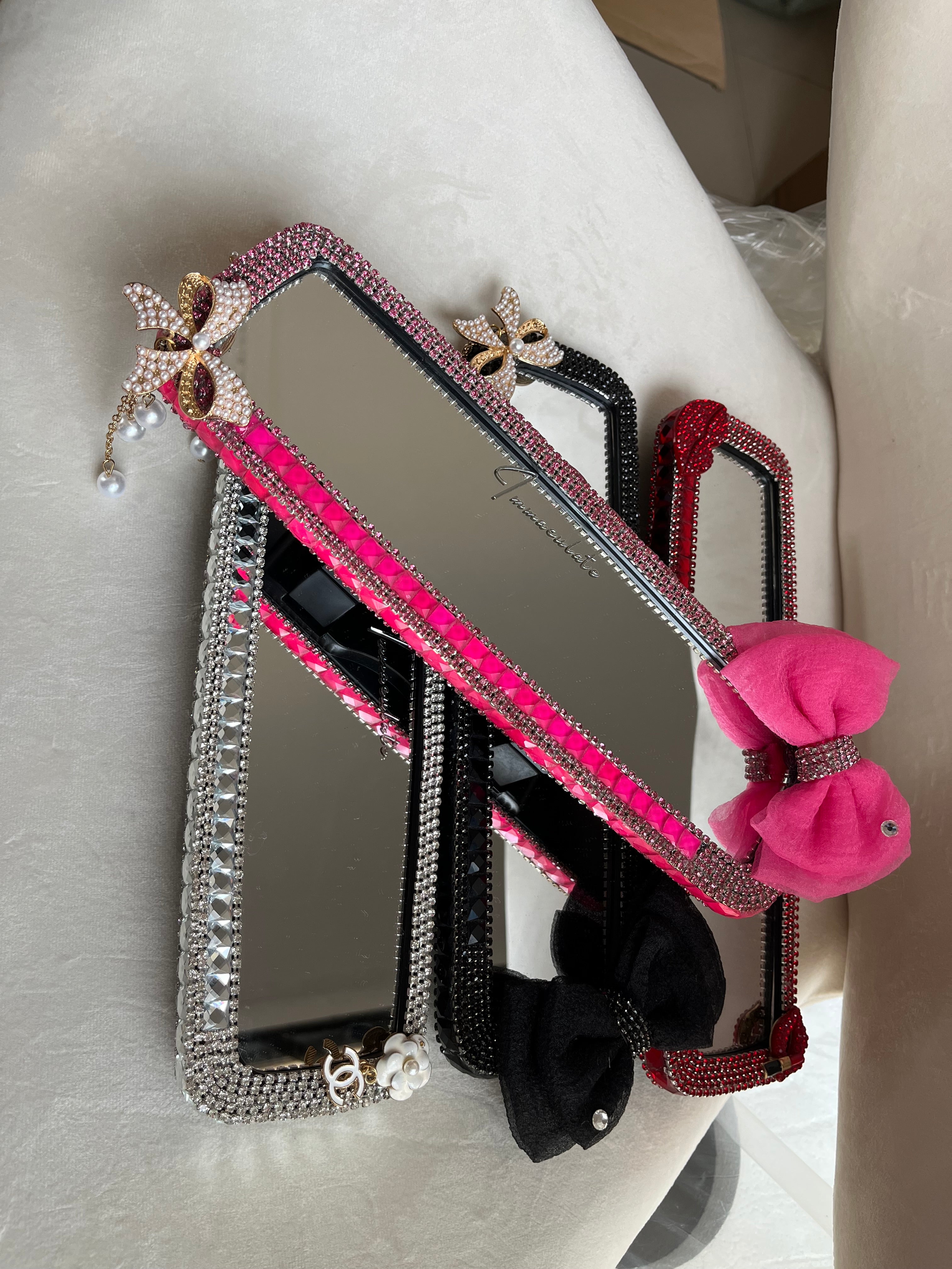 Diamond encrusted (hot pink) bow car rear view mirror cover